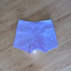 Impakt pastel purple spandex workout shorts.